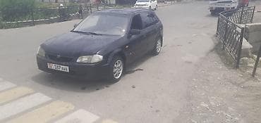 roewe rx5: Mazda 323: 2000 г., 1.8 л, Механика, Бензин, Универсал — 3
