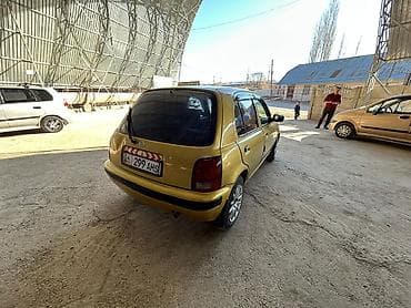 обманка глушителя: Nissan Micra: 1997 г., Автомат, Хэтчбэк — 2