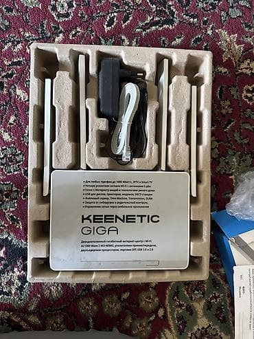 Модемы и сетевое оборудование: Keenetic Giga KN-1010 Двухдиапазонный гигабитный Wi-Fi роутер. Полный — 1