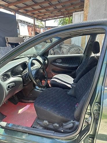 оранжевая соната: Hyundai Accent: 1990 г., 1.6 л, Механика, Бензин, Седан — 3