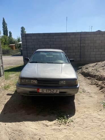 Mazda 626: 1990 г., 2.2 л, Механика, Бензин, Хетчбек — 1