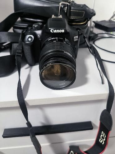 Зеркальный фотоаппарат Canon EOS 1300D с объективом Canon EF-S