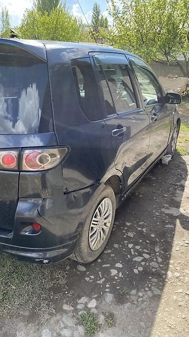 ароматизаторы: Mazda Demio: 2006 г., 1.3 л, Автомат, Бензин, Хэтчбэк — 6