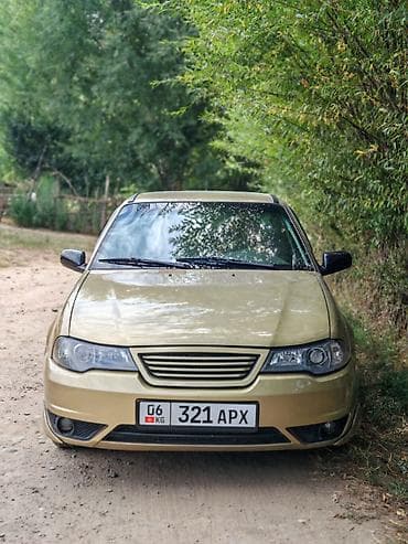 geely e5: Автомобиль седан, 4 двери, золотистый металлик. Основные особенности — 1