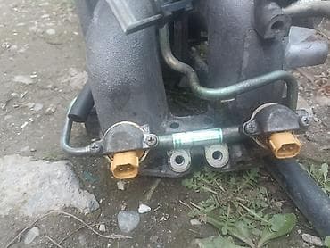 Свечи: Коллектор Subaru 2001 г., Б/у, Оригинал, Япония — 1