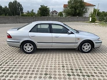 down pipe: Mazda 626: 1998 г., 2 л, Механика, Бензин, Седан — 4