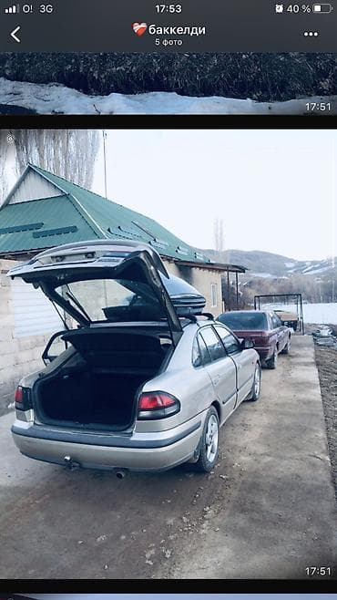 mitsubishi lancer: Mazda 2: 1998 г., 2 л, Автомат, Бензин — 2