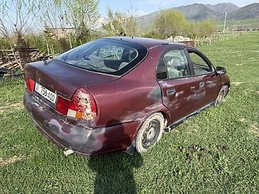 chery fora: Мицубиси Харизма 1996 года объем 1,8 кузов хетчбэк, бордовый цвет — 2