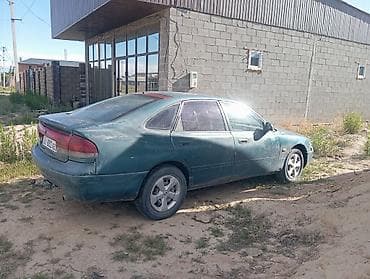 Транспорт: Mazda 626: 1993 г., 2.2 л, Механика, Бензин, Седан — 2