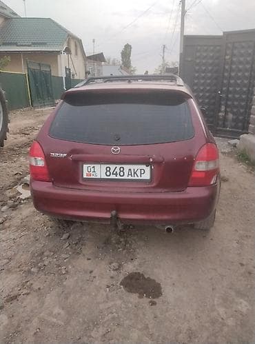 bmv e32: Mazda 323: 2001 г., 1.5 л, Универсал — 4