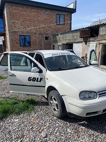 Автосервисное оборудование: Volkswagen Golf IV, 3‑дверный хэтчбек, белый цвет. Киргизская — 2