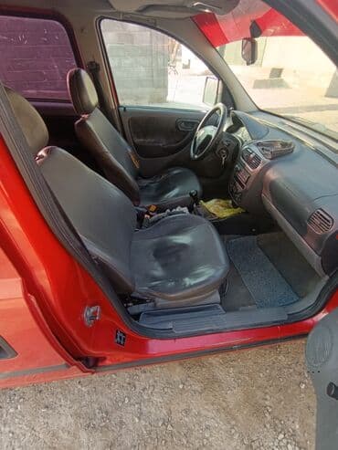 капот на стрим: Opel Combo: 2003 г., Механика, Бензиновая, Минивэн — 7