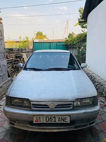daf 2018: Nissan Primera: 1996 г., 1.6 л, Механика, Бензин, Хэтчбэк — 5