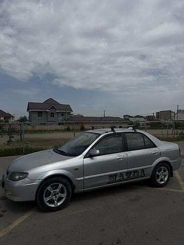 Mazda 323: 2003 г., 1.6 л, Механика, Бензин, Седан — 1