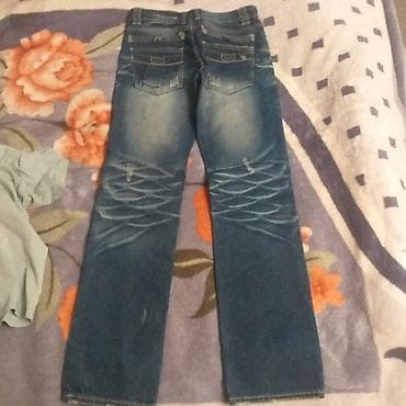 denim tears: Джинсы мужские из плотного денима синего цвета с эффектом потертостей — 1