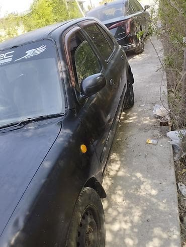 ниссан микра: Nissan March: 1996 г., 1 л, Автомат, Бензин, Хэтчбэк — 4