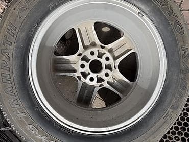 diska r13: Литой диск с шиной Toyo Tranpath A/T (A11) Для запаски на Rx 300 — 2