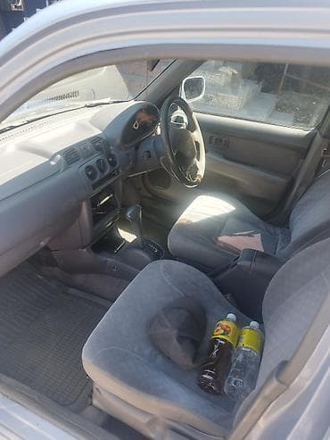 suzuki shift: Nissan March: 2001 г., 1 л, Автомат, Бензин, Хэтчбэк — 3