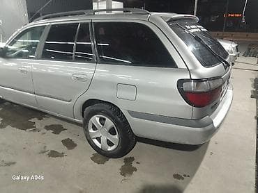 p 12: Mazda Capella: 1999 г., 0.2 л, Механика, Бензин, Универсал — 3