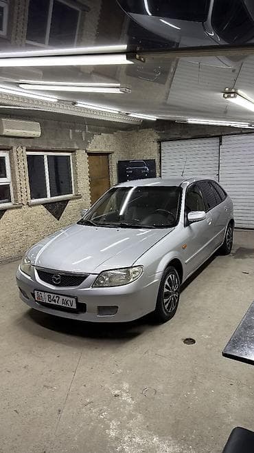 mazda d: Mazda 323: 2001 г., 1.6 л, Механика, Бензин, Универсал — 2