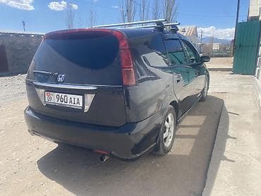 глушитель гольф 4 2.0 бензин: Honda Stream: 2004 г., 2 л, Автомат, Газ, Универсал — 2