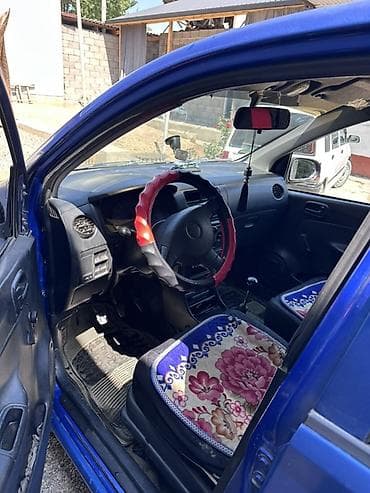 x pipe: Daihatsu Cuore: 2004 г., Механика, Хэтчбэк — 4