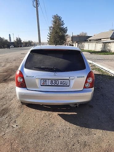 mazda 626 2002: Mazda 323: 2003 г., 1.6 л, Автомат, Бензин, Хэтчбэк — 4