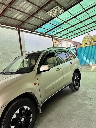 форанер 2004: Toyota RAV4: 2001 г., 2 л, Автомат, Бензин, Кроссовер — 3