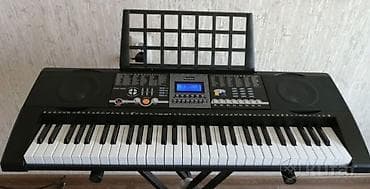Велоаксессуары: Продаю синтезатор мейке 906. новый в упаковке цена 11000 сом — 1