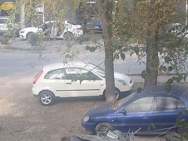 e 303: Ford Fiesta: 2003 г., 1.3 л, Механика, Бензин, Купе — 7