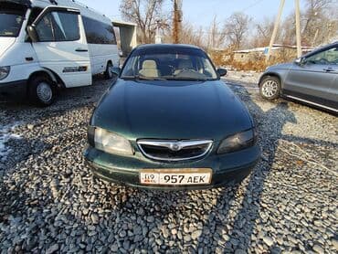 тукан пресс: Mazda 626: 1999 г., 2 л, Механика, Бензин, Седан — 6