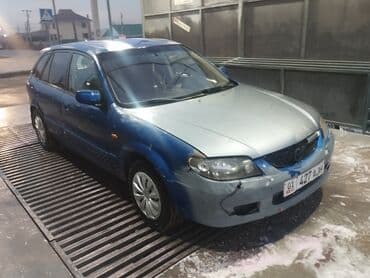 авто пулт: Mazda 323: 2001 г., Бензин, Хэтчбэк — 2