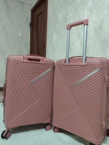 Чемодандар: Чемодан, Жаңы, Материалы: Желим, Орто (40 - 70 л), Дөңгөлөктүү — 1