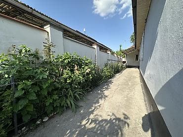 48: Кирпичные заборы, Покраска забора — 2