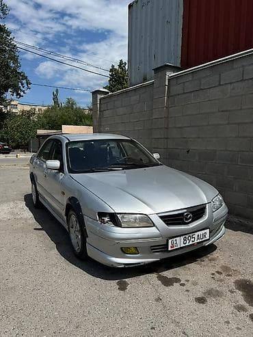 чехлы на морнинг: Mazda Capella: 2001 г., 2 л, Механика, Бензин, Седан — 2
