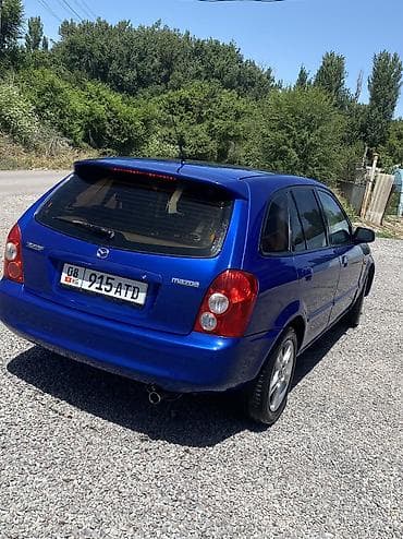 фикс токмок: Mazda 323: 2003 г., 1.6 л, Механика, Бензин, Хэтчбэк — 2