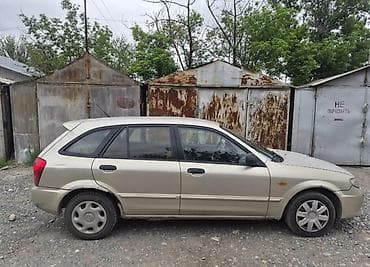lada 2105: Mazda Familia: 2002 г., 1.3 л, Механика, Бензин, Универсал — 3