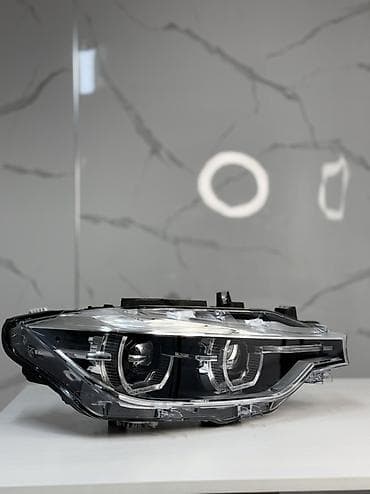Жарыктандыруу системалары: Алдыңкы сол фара BMW — 1