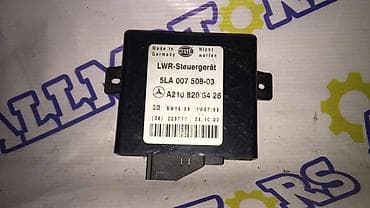 6d mark: Mercedes-Benz W210, блок корректора фар — 1