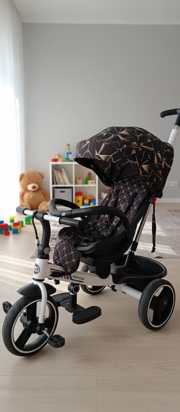Детский трехколесный велосипед‑коляска (tricycle) с родительской