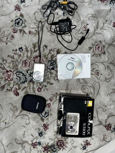 конденсаторный микрофон: Nikon cooplix s3100. Небольшой дефект объектив не до конца закрывается — 8