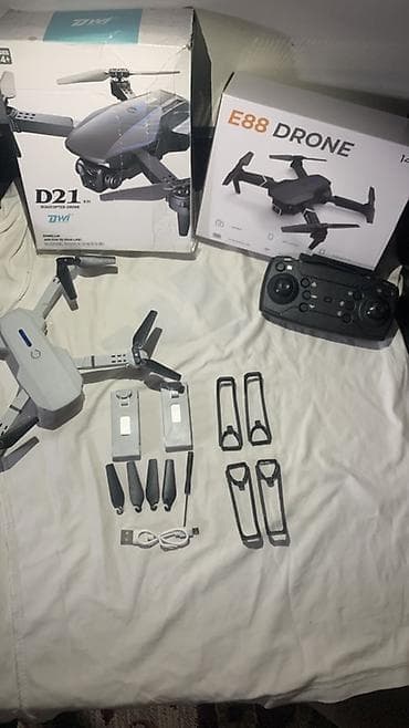 ufc диск: Квадрокоптер E88 DRONE (14+) - Складная конструкция: компактные лучи — 8