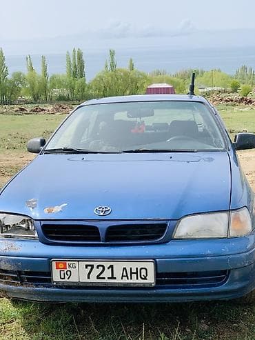 мицубиси спайс стар: Toyota Carina E: 1997 г., Седан — 2