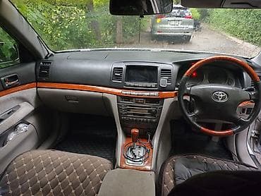копка траншеи: Toyota Mark II: 2002 г., Седан — 4