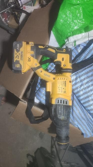 скорый: Аккумуляторный перфоратор DeWALT DCH263 XR 18 В + зарядное устройство — 5