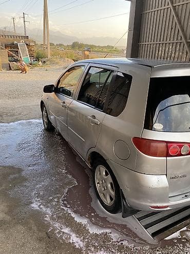Транспорт: Mazda Demio: 2003 г., 1.3 л, Автомат, Бензин — 4