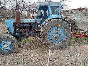 трактор т70: Трактор колесный, с кабиной, голубого цвета. Характеристики и — 4