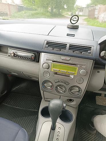 шампунь для авто: Mazda Demio: 2004 г., 1.3 л, Автомат, Бензин, Хэтчбэк — 9