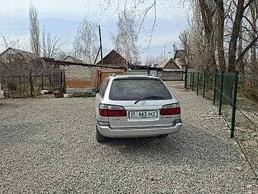 Унаа сатып алуу: Mazda Capella: 1999 г., 2 л, Кол менен иштөөчү, Бензин, Универсал — 4