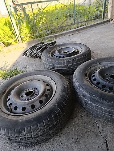 3 колес на штампованных стальных дисках R15 + комплект декоративных — 1
